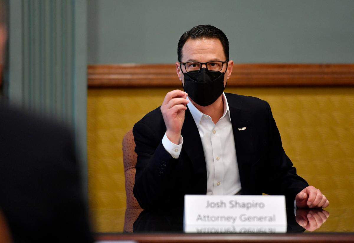 Pennsylvania Attorney General Josh Shapiro talks with Centre County officials about the impact of opioids on Wednesday.
