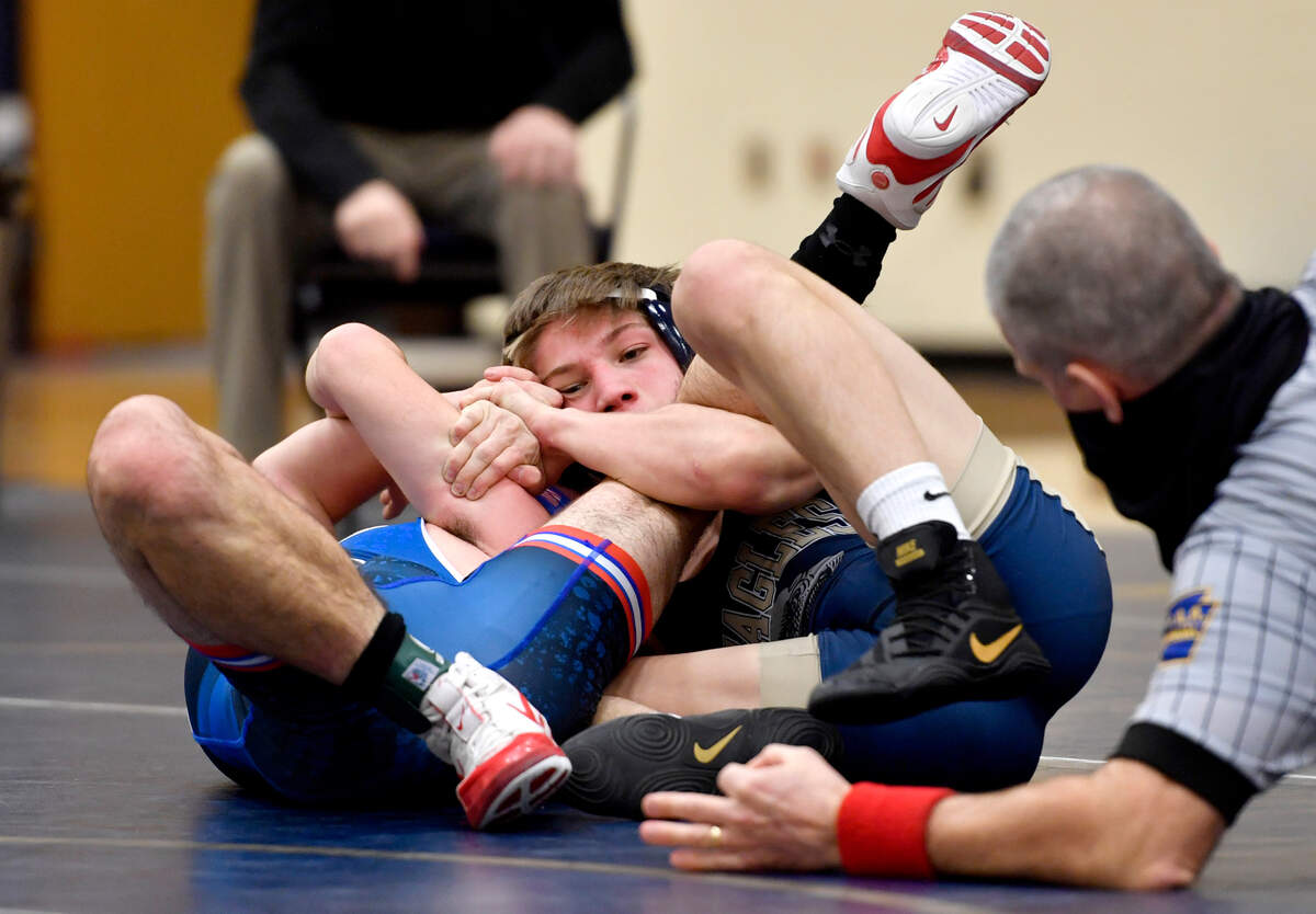 Bald Eagle Area’s Coen Bainey controls West Branch’s Landen Pase in a 113 lb bout during the District 6 AA section 2 tournament on Wednesday, Feb. 17, 2021.
