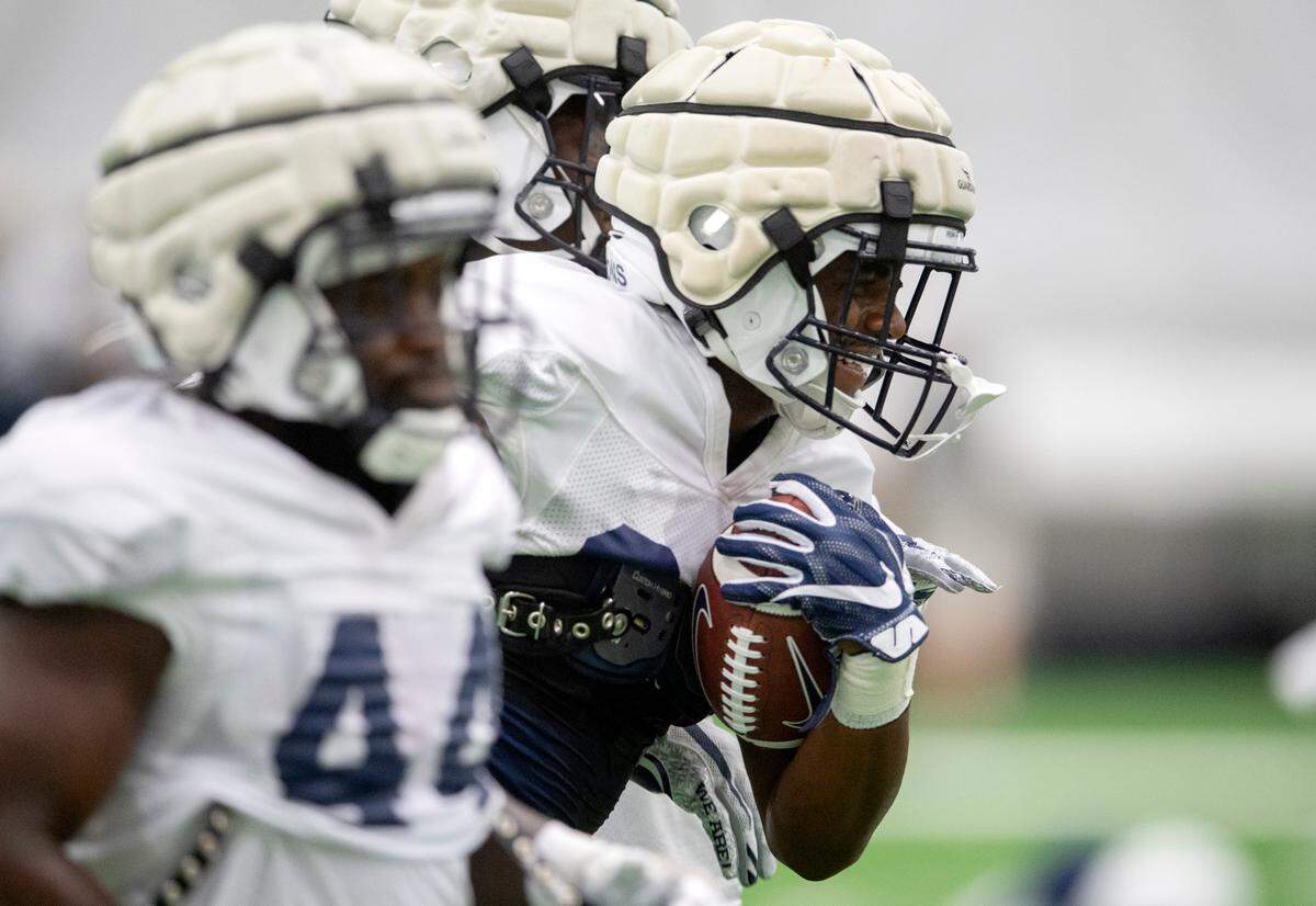 Penn State running back Devyn Ford runs a ball control drill during practice on Wednesday, Sept. 1, 2021 in Holuba Hall.