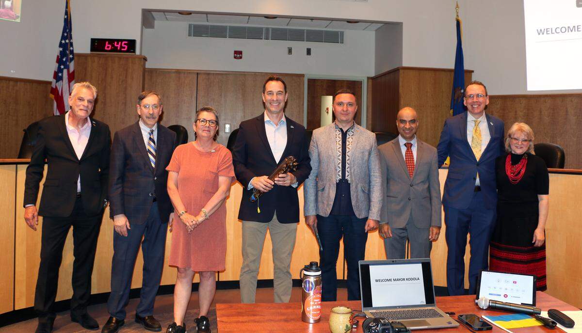 The State College BoroughCouncil  and Mayor Ezra Nanes pose with Nizhyn Mayor Oleksandr Kodola and Sister’s Sister organization founder, Svitlana Budzhak-Jones on Monday.