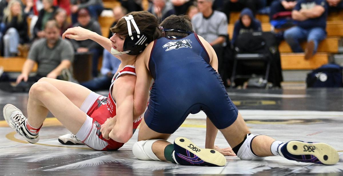 Bellefonte’s Cameron Garcia escapes from Shikellamy’s Alex Reed in their 114-pound final of the Big 7 Tournament on Saturday, January 21, 2023. Reed pinned Garcia in 1:42.