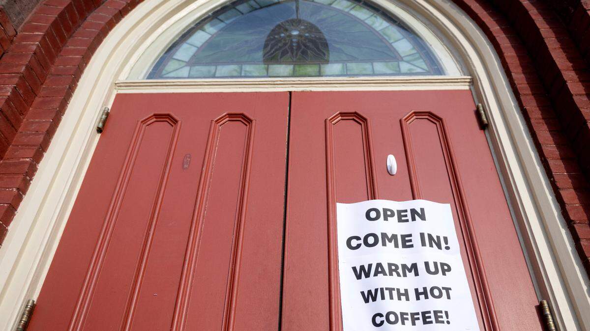 A sign at Trinity United Methodist Church on West Howard Street in Bellefonte welcomes anyone in to warm from the cold on Tuesday, Jan. 21, 2025.