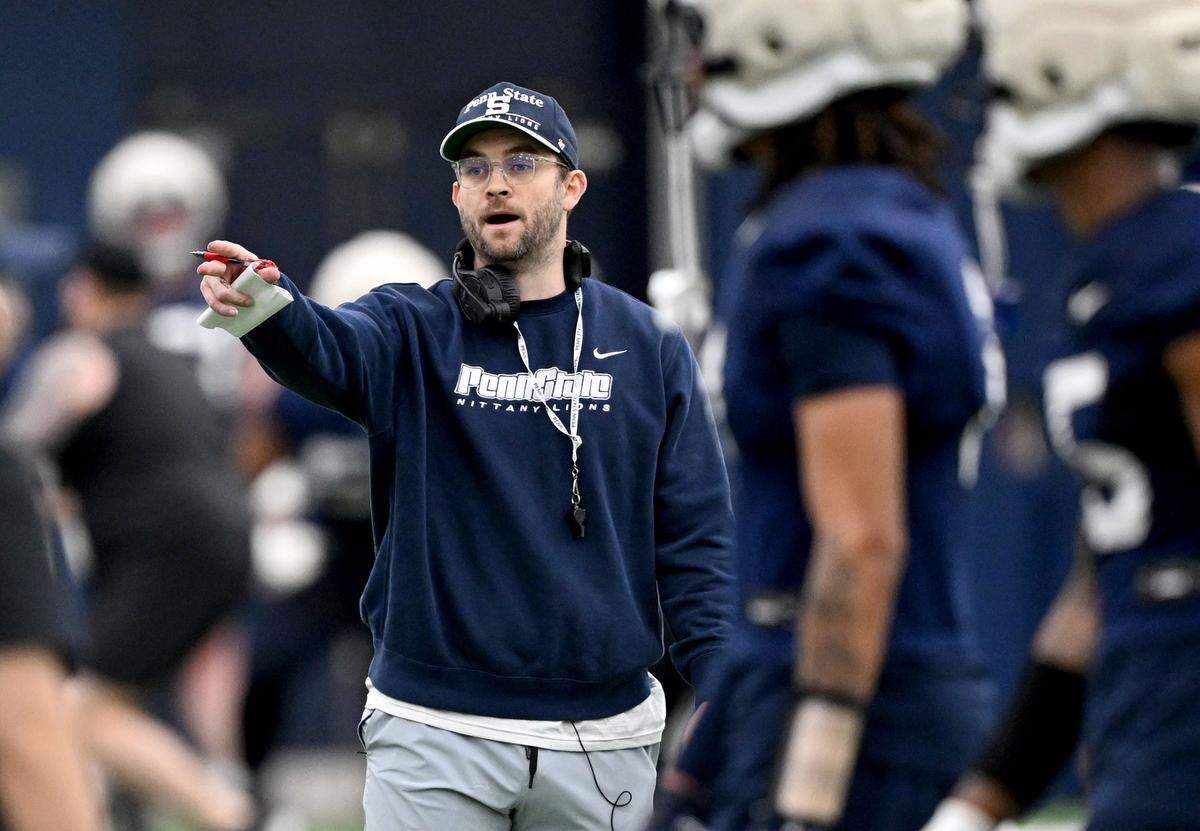 Penn State offensive coordinator Taylor Mouser talks to players during spring practice on Thursday, March 26, 2026.  