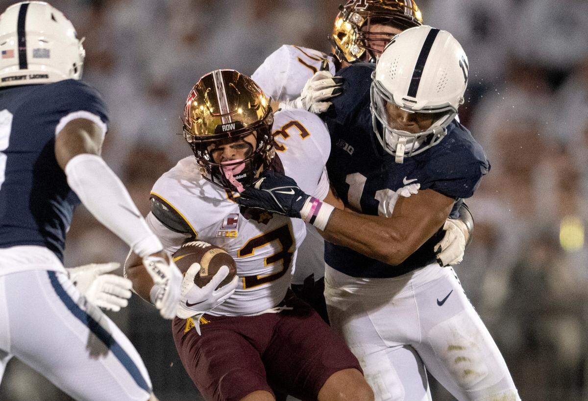 Penn State linebacker Abdul Carter stops Minnesota’s Trey Potts during the game on Saturday, Oct. 22, 2022.