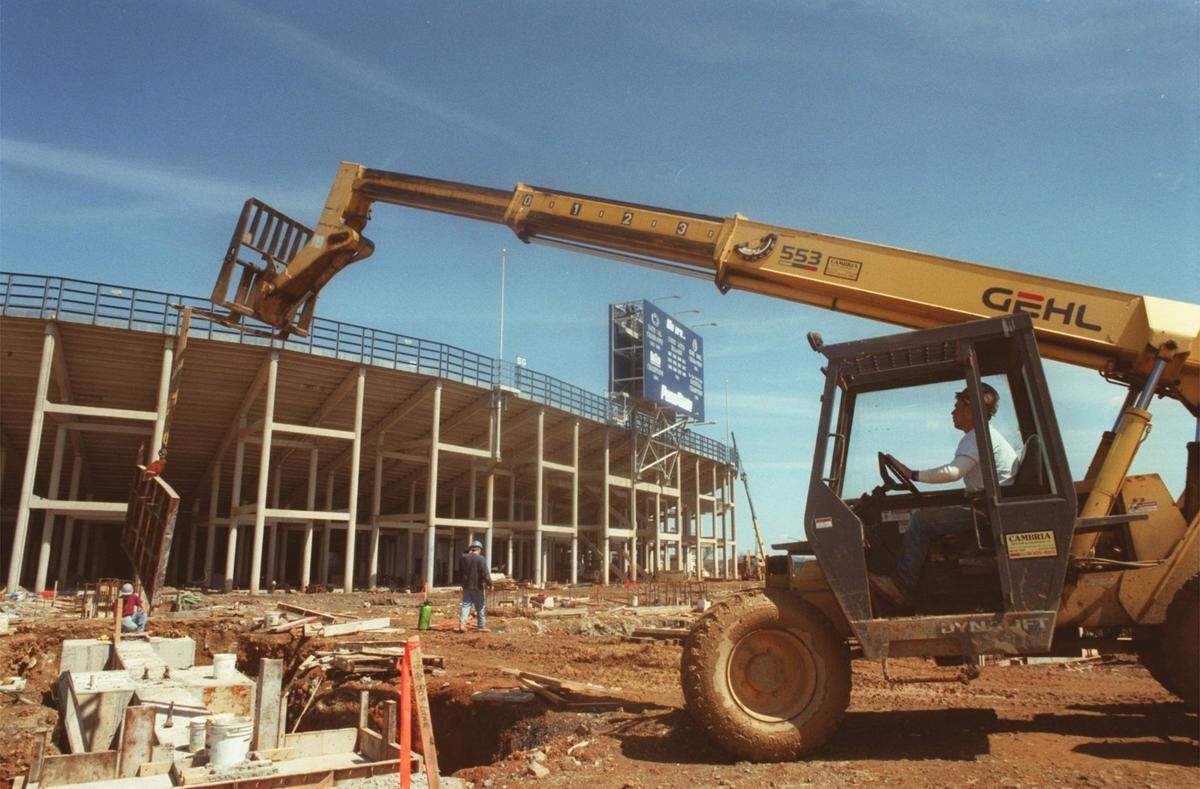 Todd Miller of Leonard S. Fiore Inc. of Altoona uses a forklift to move gang forms at the Beaver Stadium Expansion construction site on April 24, 2000.