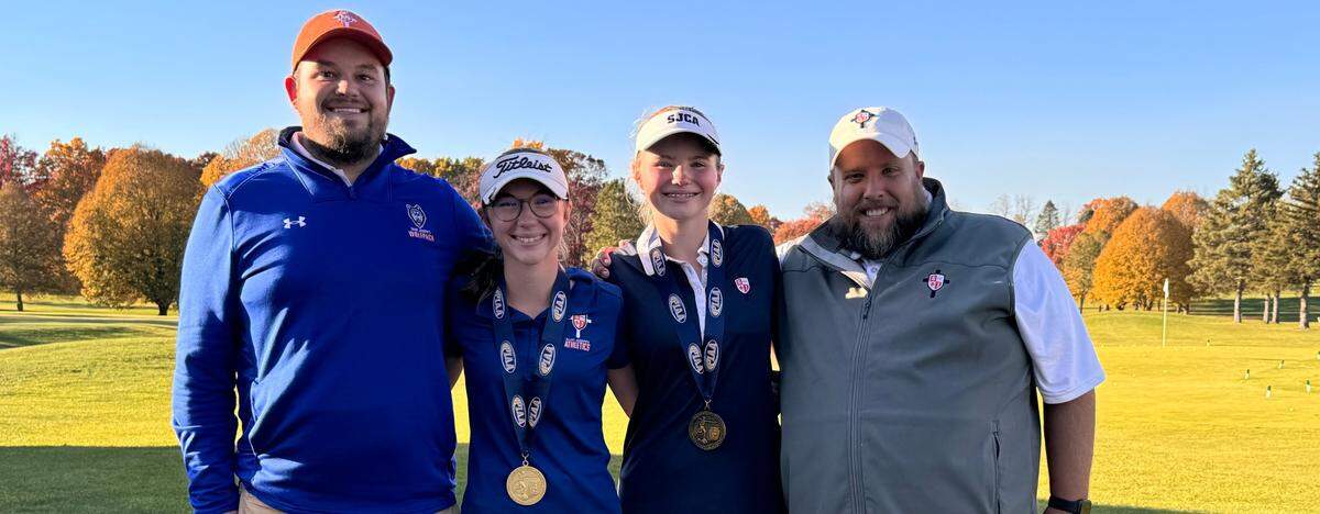 Saint Joseph’s Catholic Academy golfers Madison Koshko and Olivia Koshko with coaches Matthew Graham and Chad Walsh after the PIAA 2A Golf Championships on Tuesday, Oct. 22, 2024.