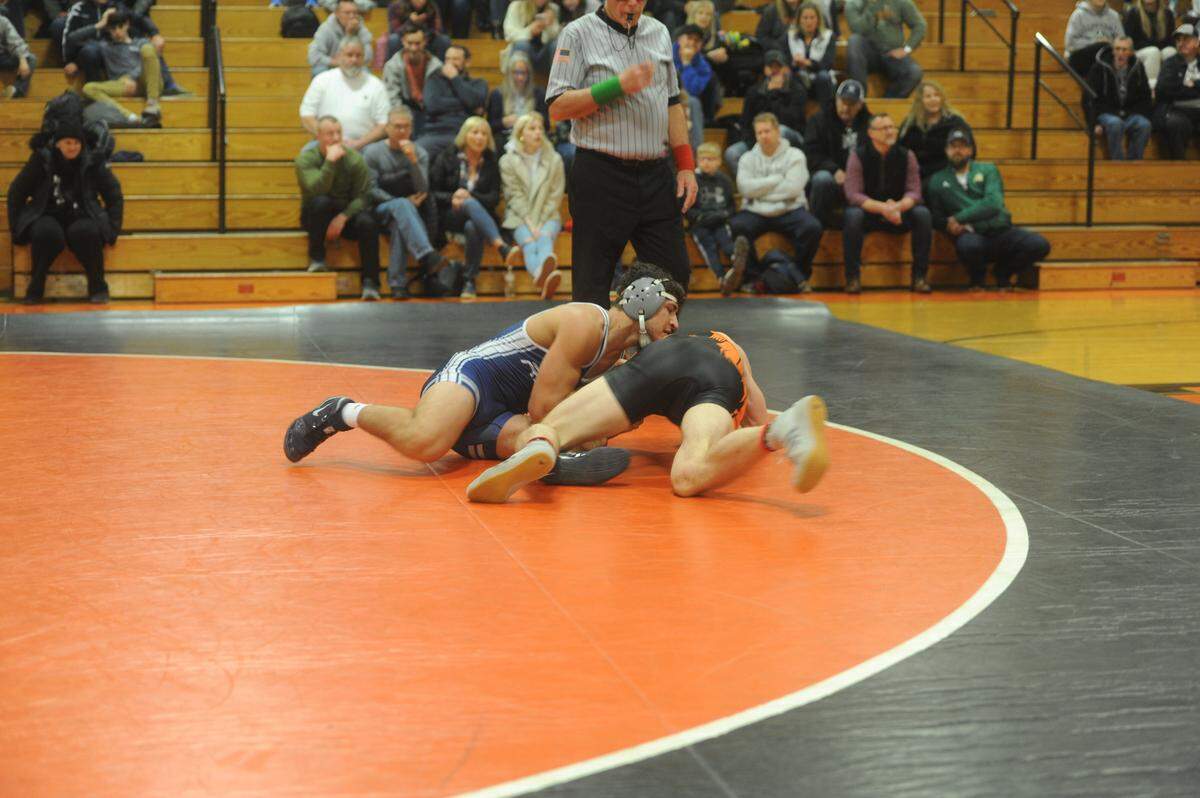 Penns Valley’s Cole Felker attempts to keep Tyrone’s Zach Lash from escaping in their 189-pound bout during the Rams’ 39-31 loss on Tuesday. Felker topped Lash 9-4.