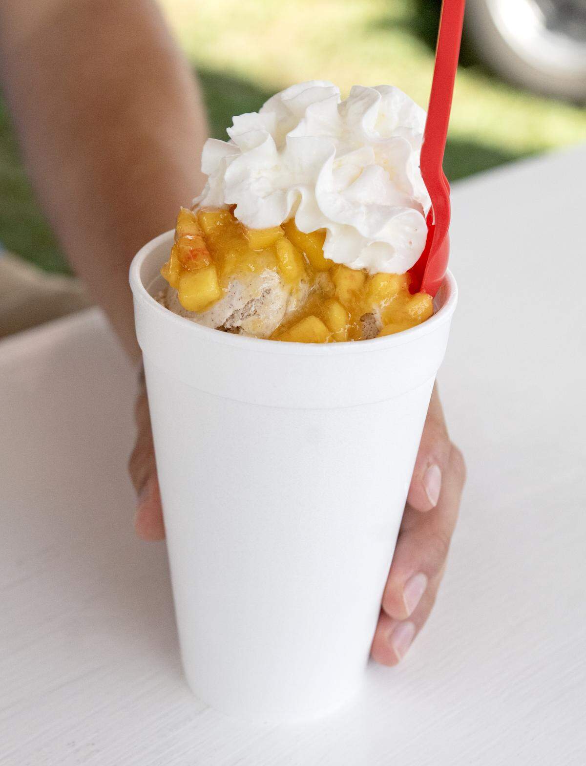 A peach parfait with cinnamon ice cream from Bissinger’s Old Fashion Dumplings and Ice Cream at the Centre County Grange Fair on Friday, Aug. 15, 2025.