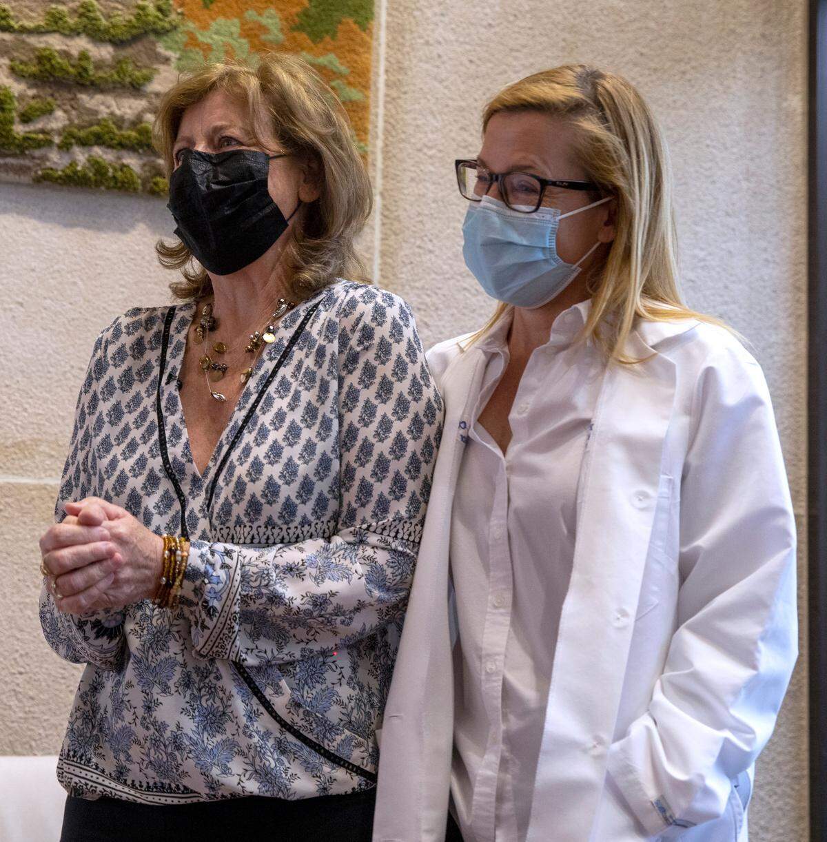 Maureen Stathes, left, excitedly awaits the arrival of Dwayne Weller so they can meet for the first time in the lobby of Penn State Health Milton S. Hershey Medical Center on Wednesday, April 6, 2022. Stathes donated a kidney to Weller and they met to help celebrate National Donate Life Month. Waiting with Stathes is Amy Wildasin, her transplant coordinator from the Division of Transplantation.
