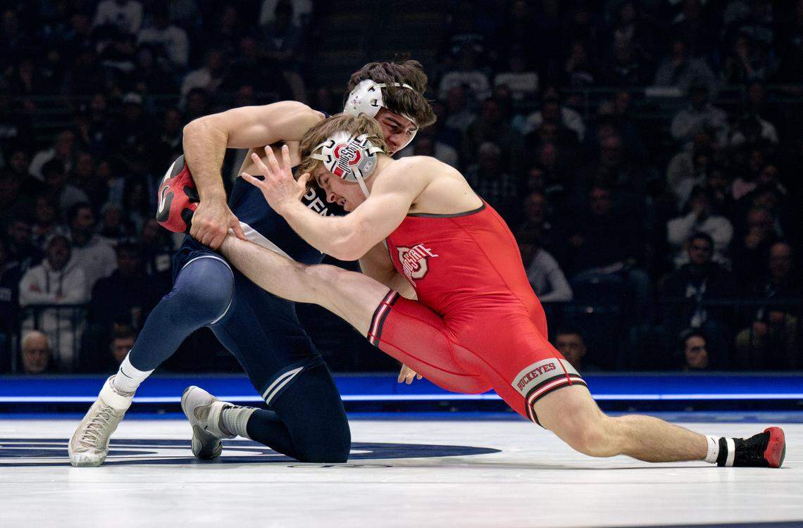 Penn State's PJ Duke controls Ohio State’s Daxton Chase in the 157 lb bout on Friday, Feb. 13, 2026 at the Bryce Jordan Center.
