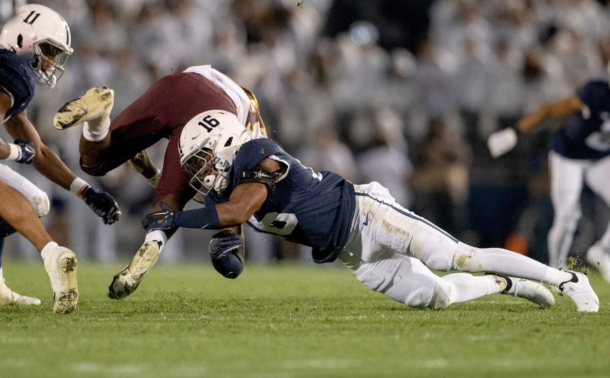 Penn State safety Ji’Ayir Brown stops Minnesota’s ball carrier during the game on Saturday, Oct. 22, 2022.