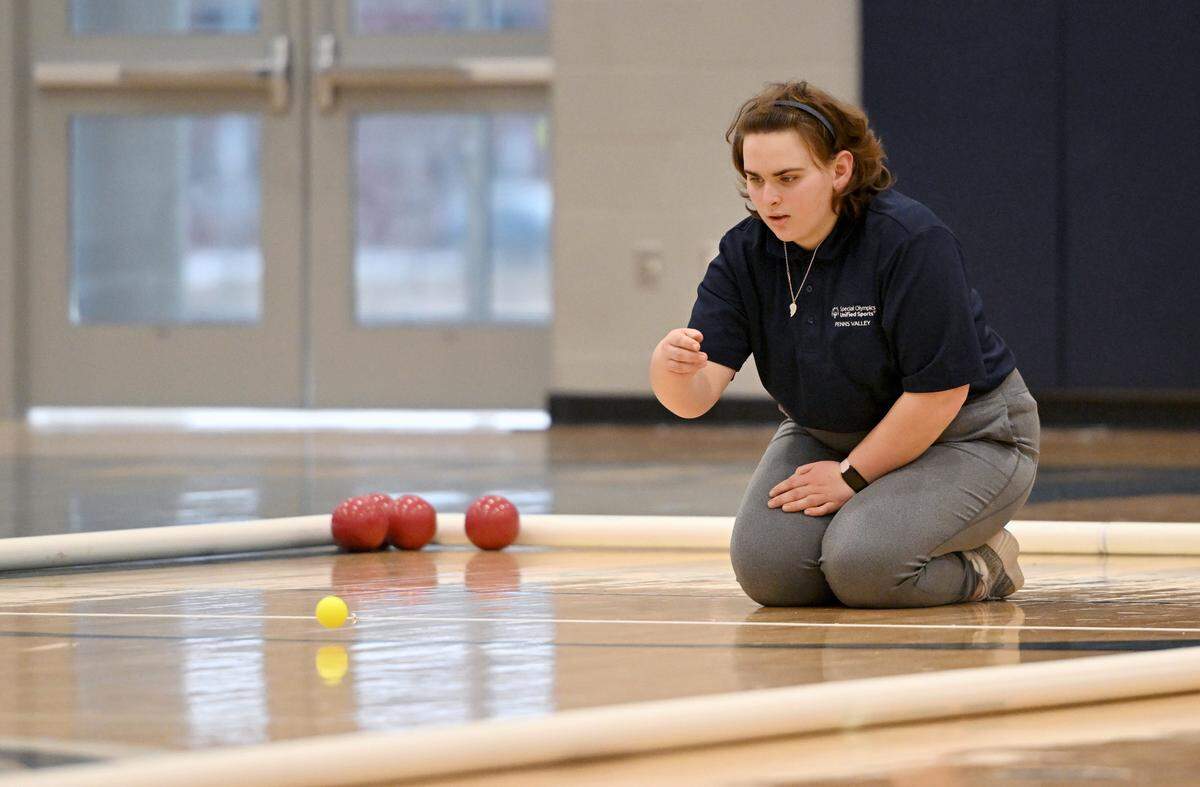 Penns Valley’s Emily Roland rolls the pallino during the unified bocce match against Philipsburg-Osceola on Thursday, Jan. 30, 2025.