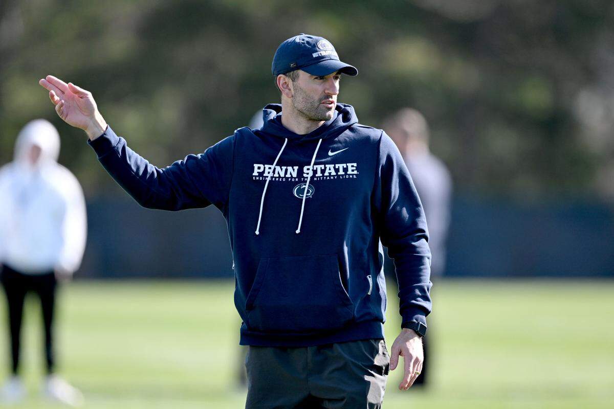 Penn State quarterbacks coach Jake Waters explains a play during practice on Thursday, April 9, 2026.  