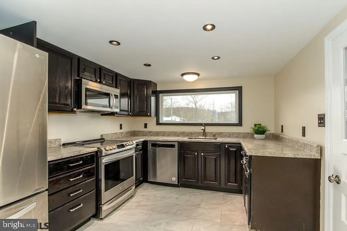 A view of the renovated kitchen at 680 Old 220 Road. Photo shared with permission from home’s listing agent, McKenzie Millward of RE/MAX Centre Realty and the McKenzie Millward Group.
