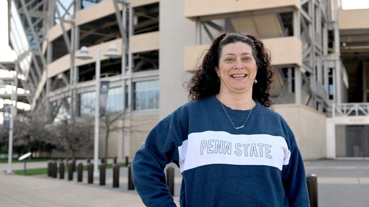 Susie Soto poses outside of Beaver Stadium on Wednesday, April 19, 2023. Soto will participate in Over the Edge fundraiser and rappel down Beaver Stadium.