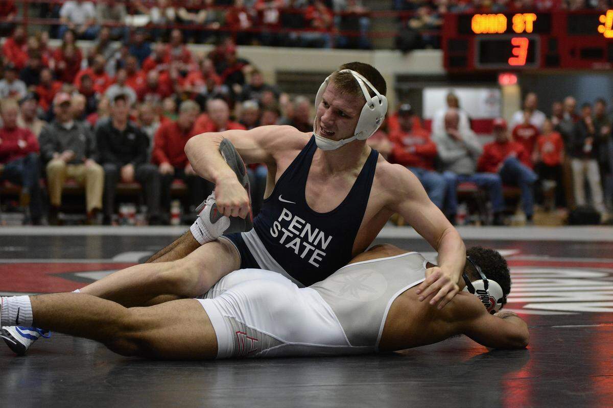 Penn State’s Jason Nolf earns a technical fall over Ohio State’s Ke-Shawn Hayes in the a57-pound bout on Friday in St. John Arena in Columbus, Ohio.