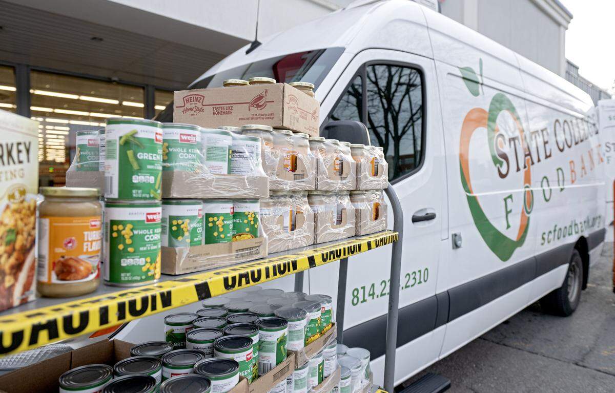 The Cherry Tailgate Group raised money throughout the Penn State football season to donate the makings for at least 80 Thanksgiving dinners to the State College Food Bank on Monday, Nov. 24, 2025.