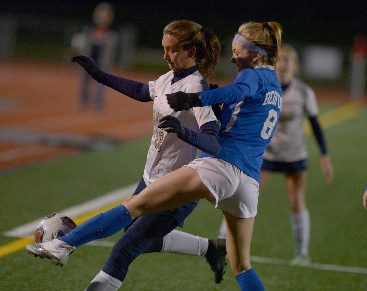 Bedford’s Juliana Taylor (8) attempts to advance the ball upfield past Bald Eagle Area’s Heather Leskovansky during first half action Thursday, Nov. 4, 2021 at Altoona’s Mansion Park.