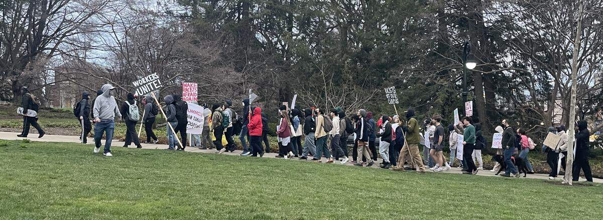 A group of about 50 Penn State student protesters ended their march at Old Main on Tuesday night after starting at the Allen Street Gates and walking through College and Beaver avenues in downtown State College.