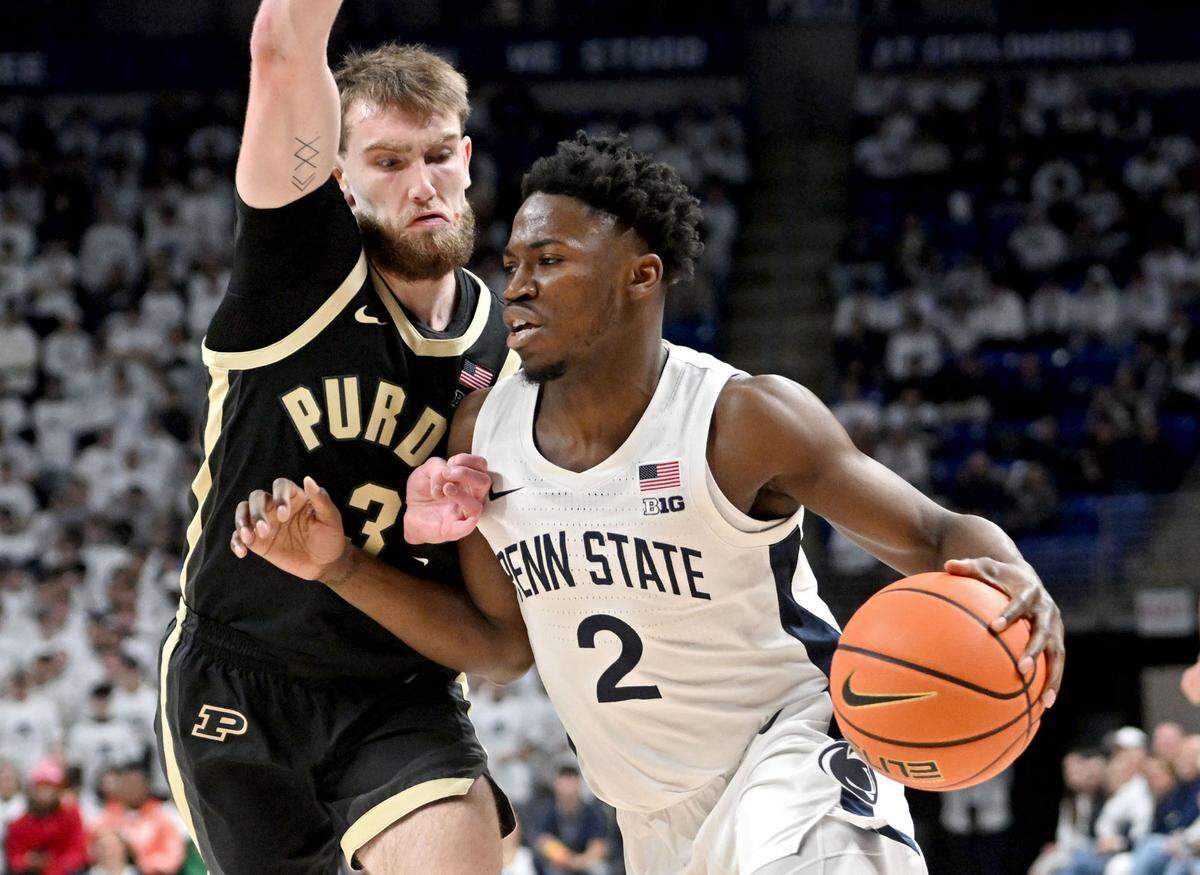 Penn State’s D’Marco Dunn pushes around Purdue’s Braden Smith during the game on Thursday, Dec. 5, 2024.
