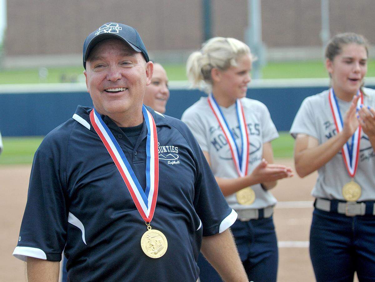 Philipsburg-Osceola head coach Jim Gonder smiles as he looks to the crowd as the softball team celebrates winning PIAA Class AA State Championship game against Brandywine Heights on Friday, June 17, 2011 at Beard Field. CDT/Abby Drey