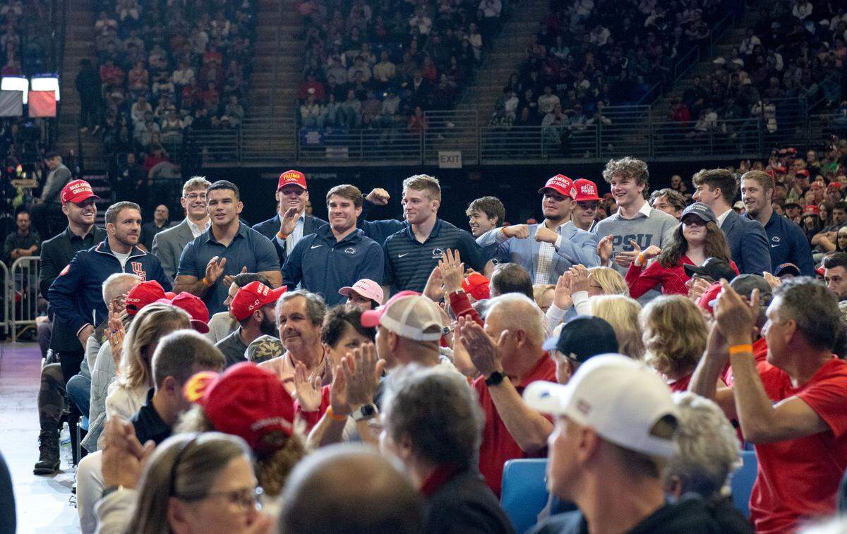 A group of former and current Penn State wrestlers are recognized during Rep. John Joyce’s comments at the Donald Trump rally at the Bryce Jordan Center on Saturday, Oct. 26, 2024.
