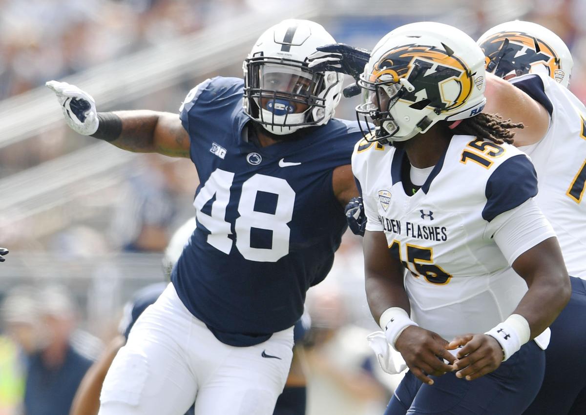 Penn State defensive end Shareef Miller reaches for Kent State quarterback Woody Barrett during a game Saturday, Sept. 15, 2018 at Beaver Stadium.