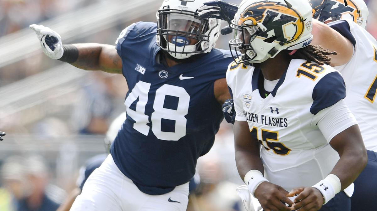 Penn State defensive end Shareef Miller reaches for Kent State quarterback Woody Barrett during a game Saturday, Sept. 15, 2018 at Beaver Stadium.