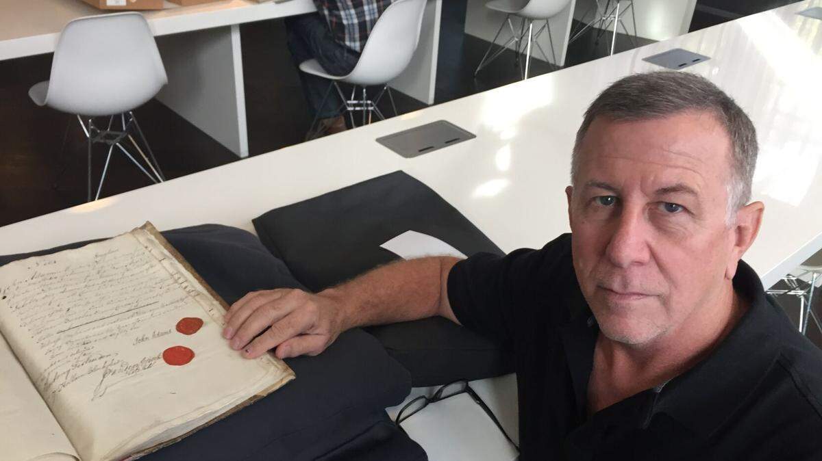 Johnstown native Vincent Pankoke is shown at the Amsterdam City Archive during an investigation into the arrest of Anne Frank and her family in 1944. Pankoke, a retired FBI agent, led the effort to determine who told the Nazis where the Frank family was hiding.