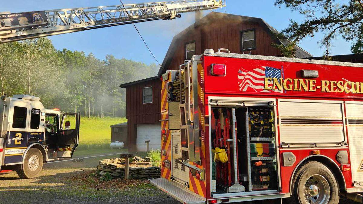 Firefighters respond to a fire in the 800 block of Uzzell Road on Monday, June 24, in Snow Shoe.