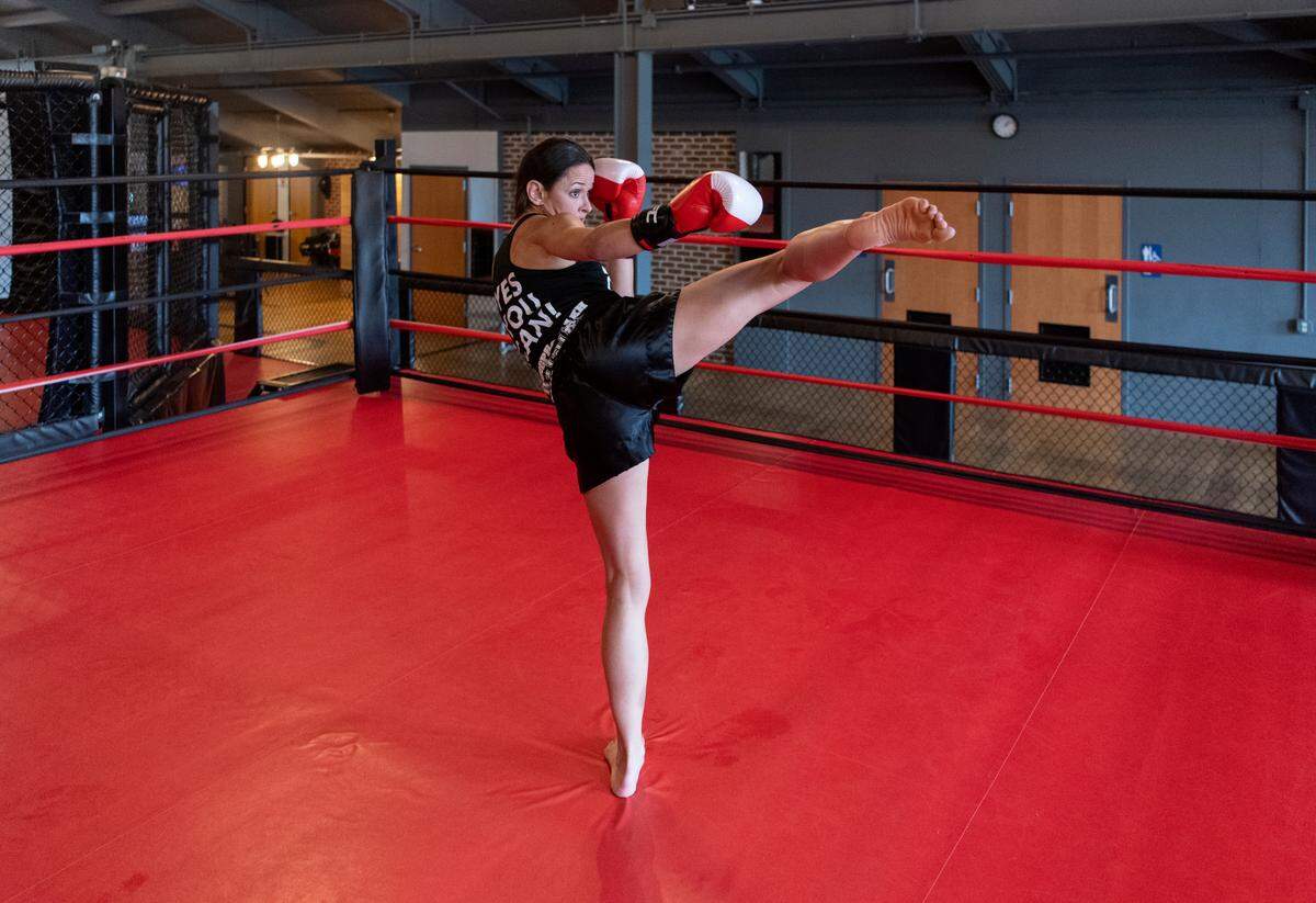 Elise Pone moves through a series of Muay Thai moves at Central PA Mixed Martial Arts on Thursday, July 7, 2022.