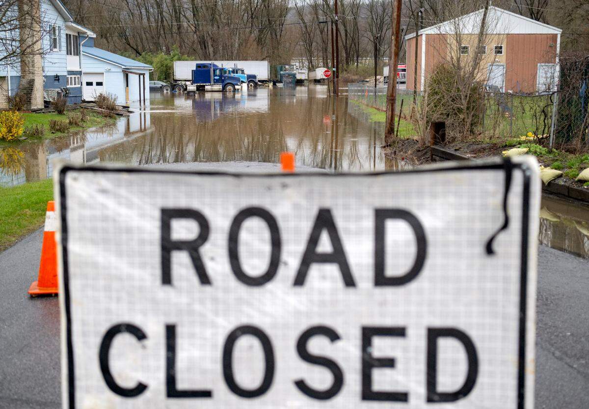 Second Avenue is closed due to flooding in Milesburg on Wednesday, April 3, 2024.