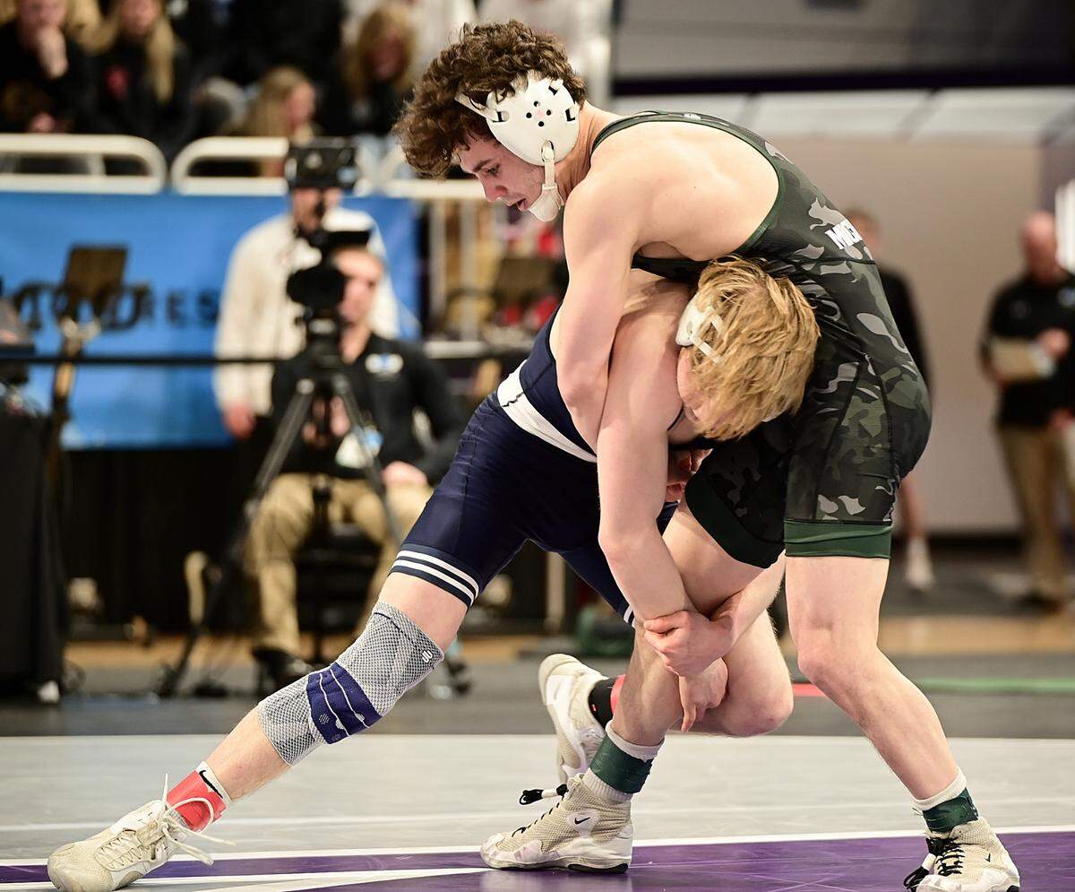 Penn State’s Braeden Davis looks to finish off a takedown of Michigan State’s Andrew Hampton in their 133-pound first round match of the Big Ten Championships on March 8 inside Welsh Ryan Arena in Evanston, Ill. Davis defeated Hampton, 11-2.