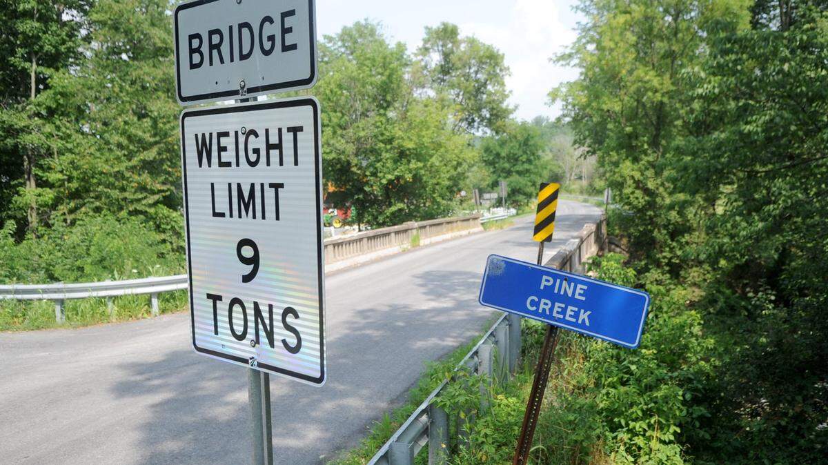 The bridge over Pine Creek about one mile north of Coburn on Pine Creek Road, Tuesday, July 19, 2011. CDT/Christopher Weddle