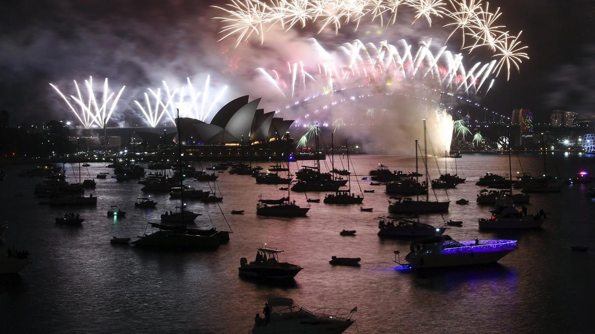 Fireworks explode over Sydney Harbour during New Year's Eve celebrations in Sydney, Monday, Jan. 1, 2018. (David Moir/AAP Image via AP)