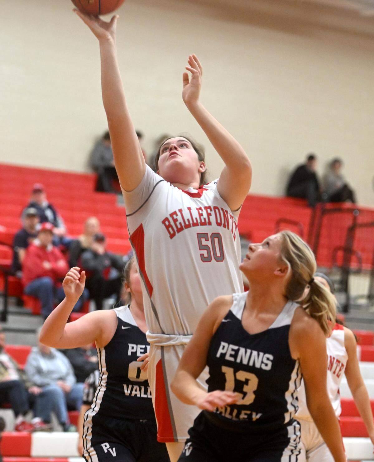Bellefonte’s Jaylee Lose goes in for a basket over Penns Valley defenders during the game on Monday, Jan. 23, 2023.