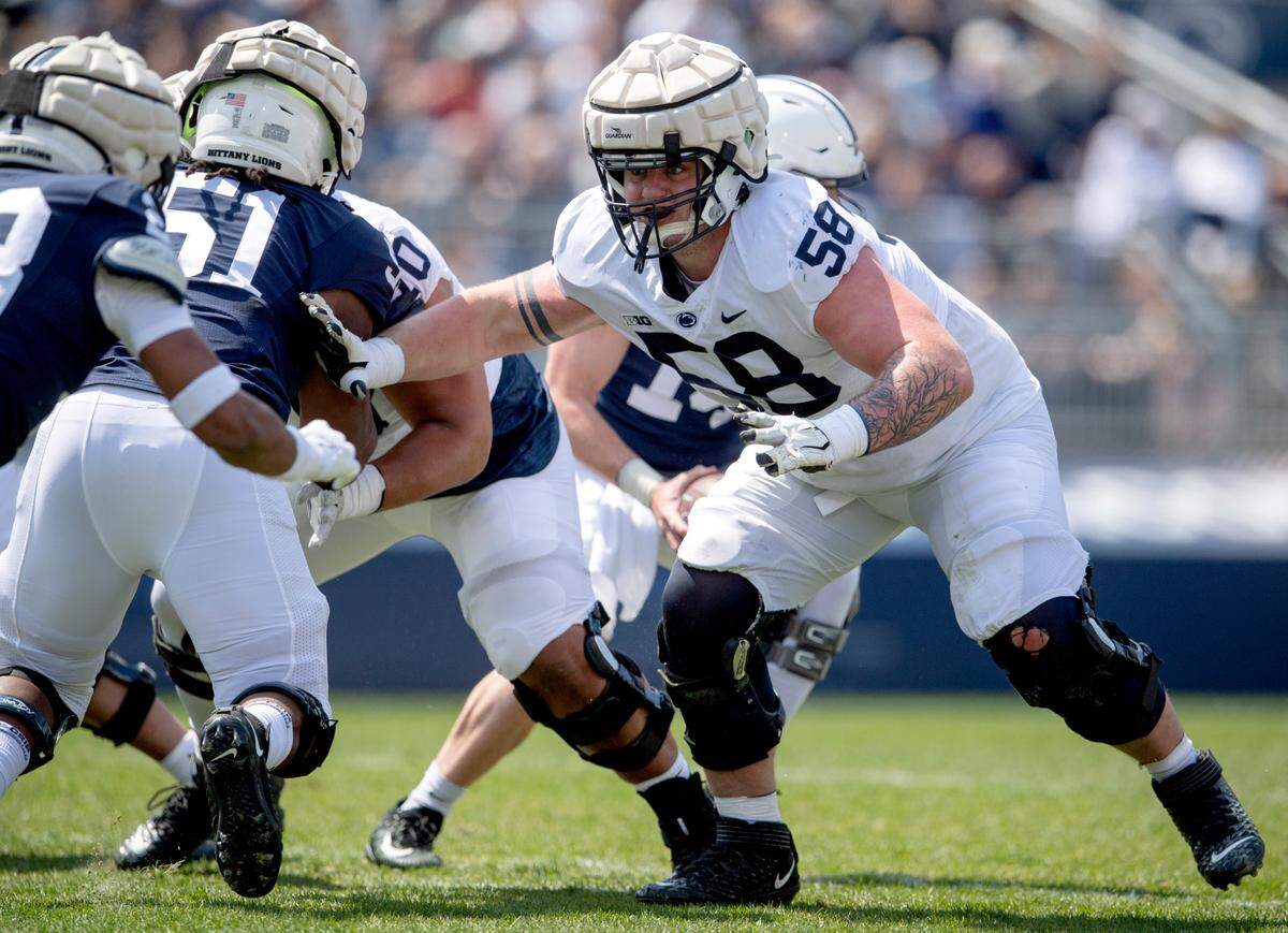 Penn State offensive lineman Landon Tengwall during a play at the Blue-White game on Saturday, April 23, 2022.