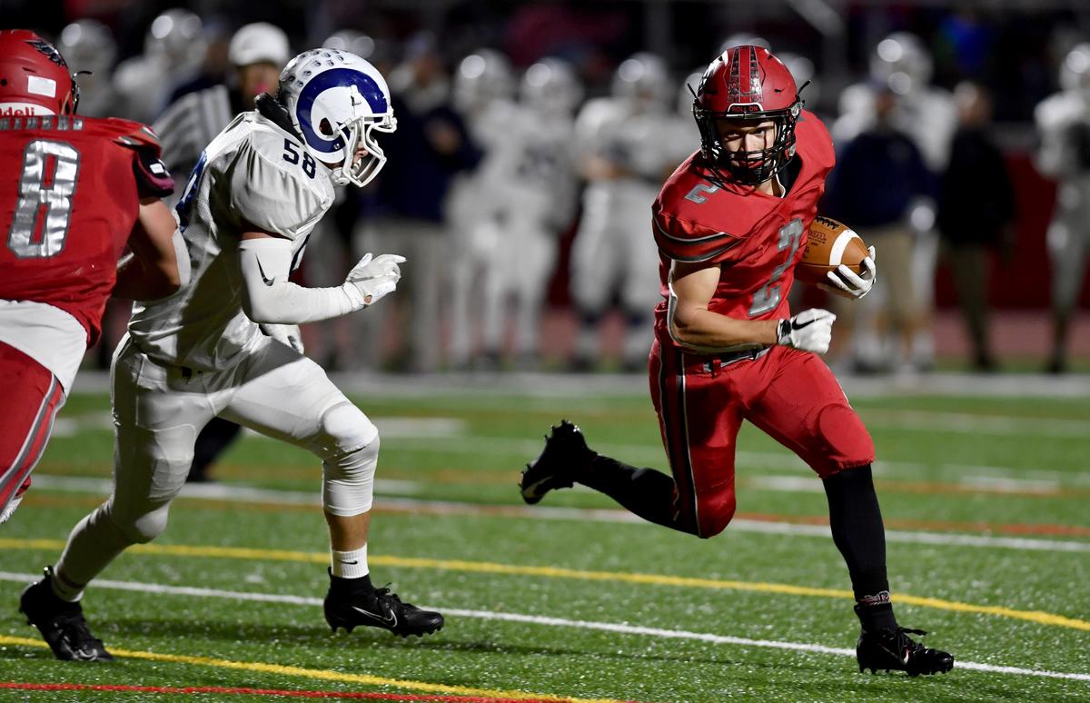 Penns Valley’s Zach Royer stops Bellefonte’s Nick Capparelle short of the goal line during the game on Friday, Oct. 4, 2019.