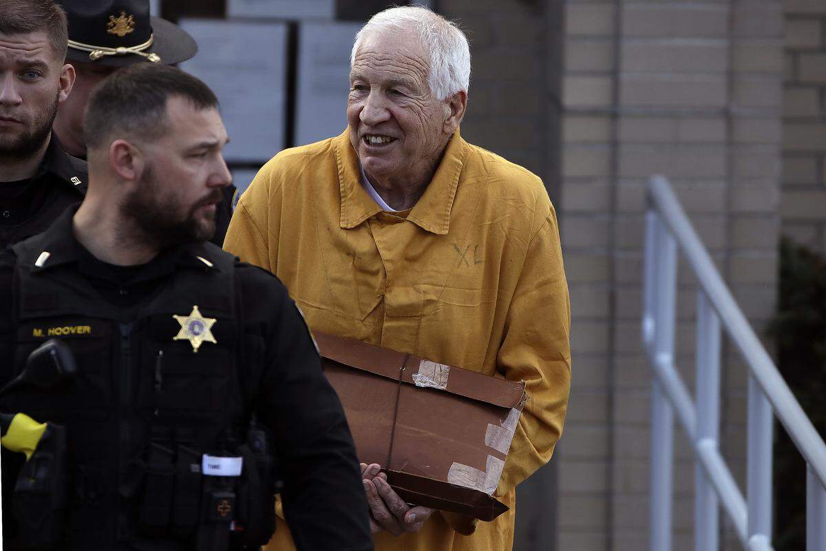 Former Penn State University assistant football coach Jerry Sandusky leaves the Centre County Courthouse after attending a resentencing hearing on his 45-count child sexual abuse conviction Friday.