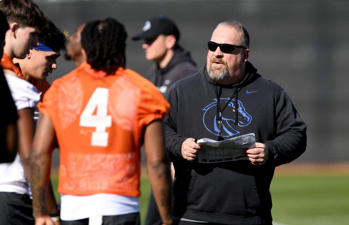 Boise State special teams coordinator Stacy Collins talk to his players during practice for the Fiesta Bowl on Sunday, Dec. 29, 2024 Indian School Park.