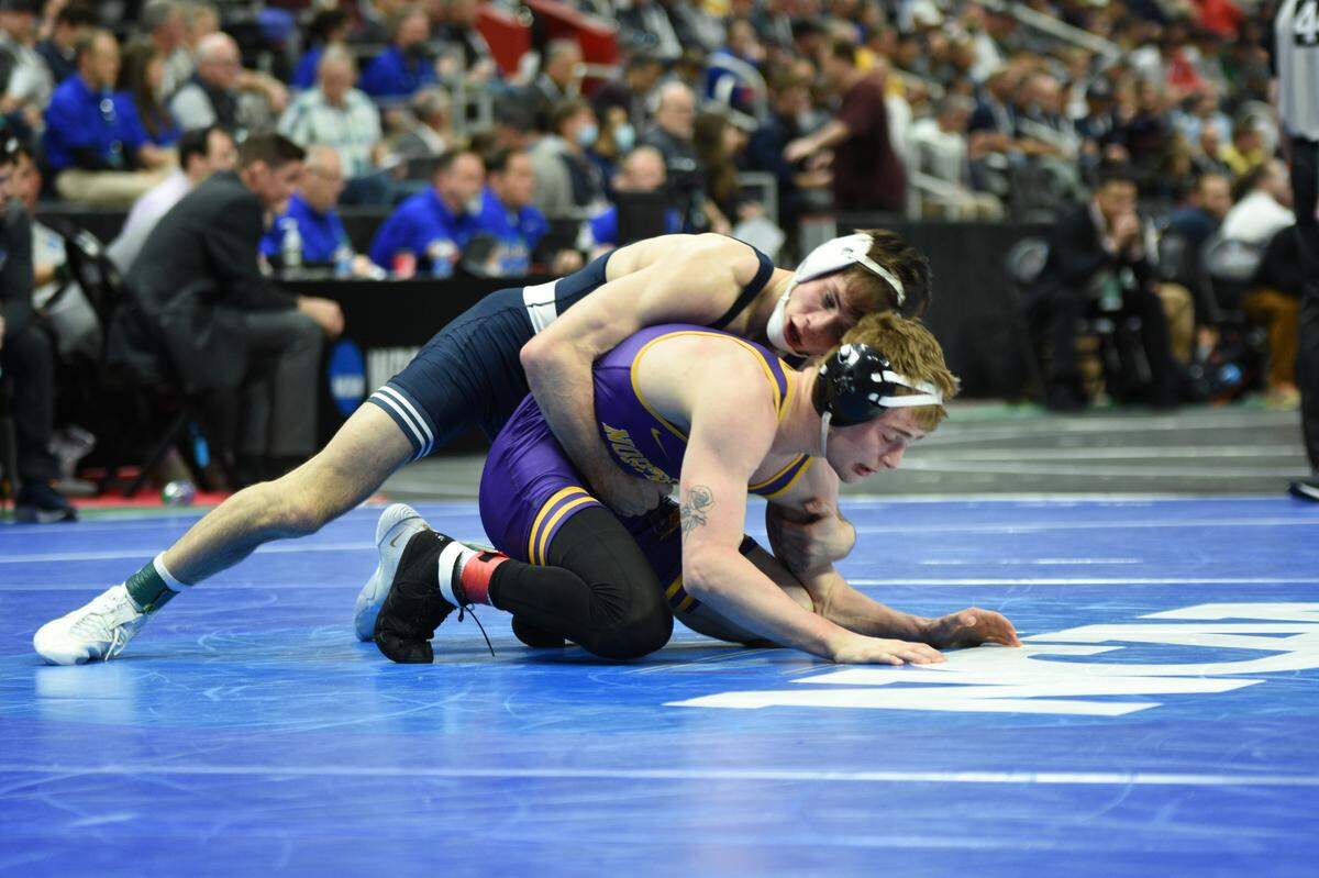 Penn State’s Drew Hildebrandt controls Northern Iowa’s Brody Teske during their 125-pound consolation first round match of the NCAA Championships on Friday, March 18, 2022 at Little Caesars Arena in Detroit. Teske beat Hildebrandt, 8-4, to end Hildebrandt’s season.