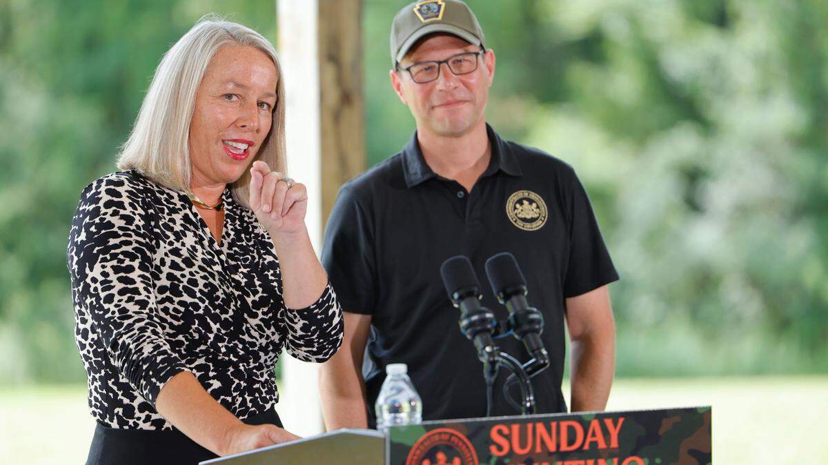 State Rep. Mandy Steele (D., Allegheny) and Democratic Gov. Josh Shapiro at the Sunday hunting bill signing.