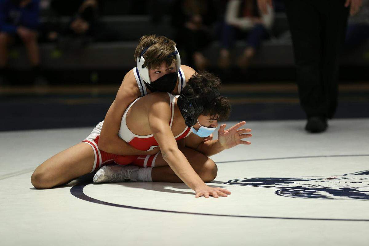 Penns Valley’s Colton Shunk controls Bellefonte’s Garrett Choates in their 106-pound bout on Thursday. Shunk topped Choates 12-1 as the Rams fell to the Red Raiders 43-15.