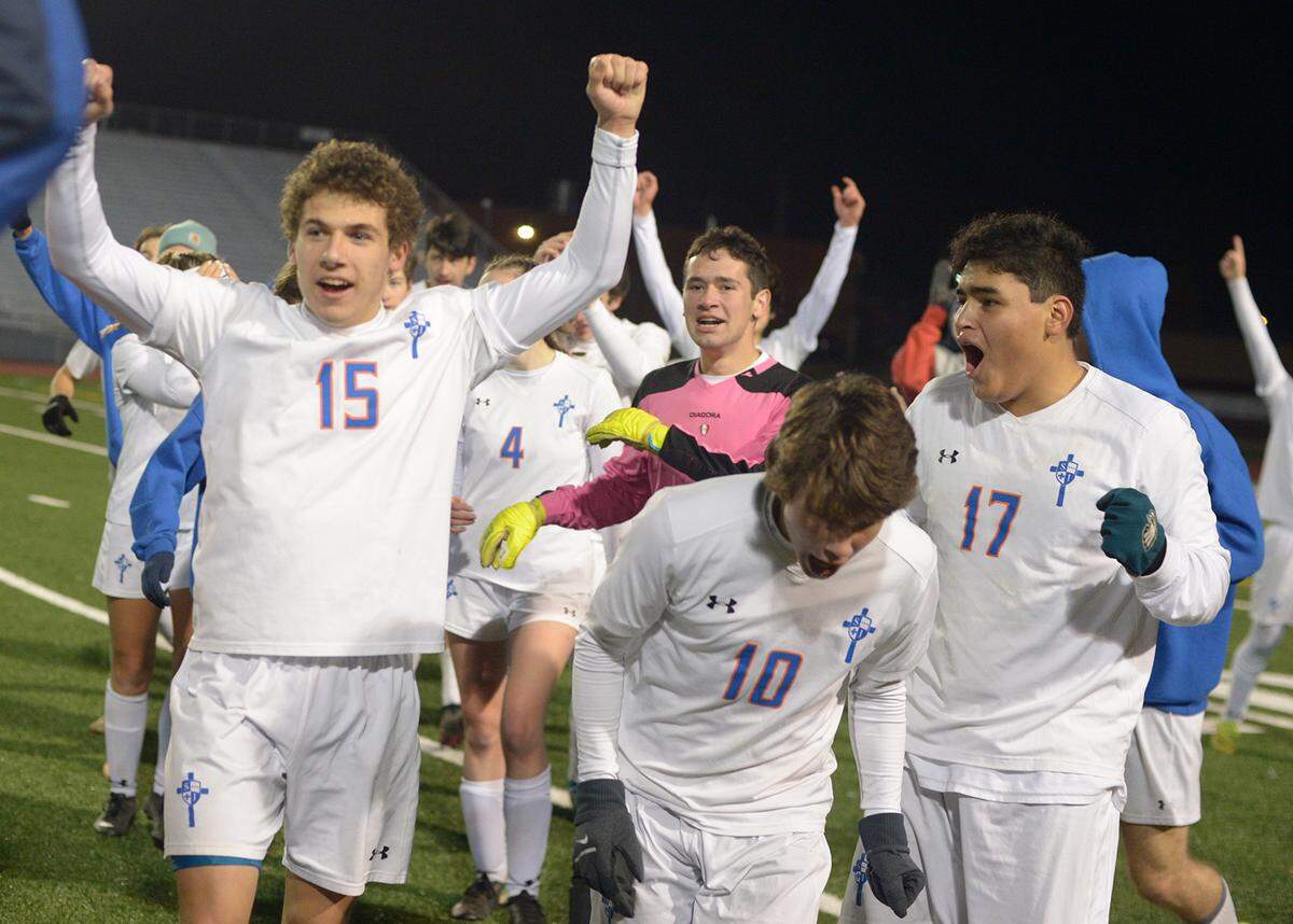 Saint Joseph’s Catholic Academy’s, from left, Samuel Langula, Kyle Yangula and Arthur Welsh come off the field after defeating West Shamokin for the District 6 A championship Thursday at Atloona’s Mansion Park.
