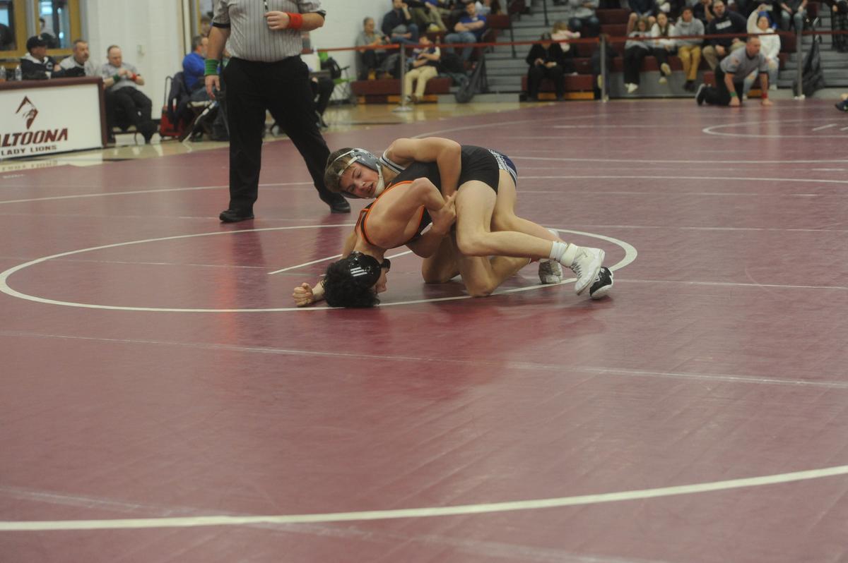 Penns Valley’s Brayden Lisowski controls Tyrone’s Logan Rumberger in their 121-pound quarterfinals match of the District 6 Class 2A Championships on Friday, Feb. 17, 2023 in Altoona. Lisowski upset the No. 2 seed, 4-1.