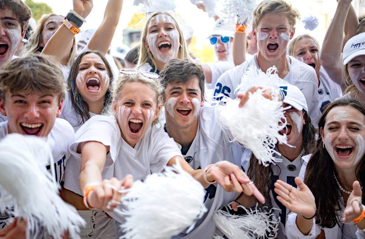 Students who camped out all week as part of Nittanyville wait to get into Beaver Stadium.