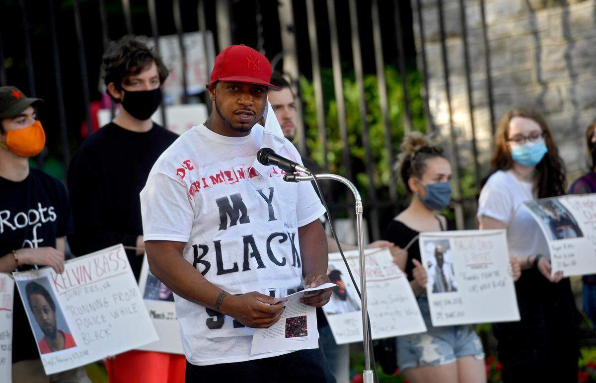 Divine Lipscomb reads a list of demands during the “Justice for Black Lives” protest organized by the 3/20 Coalition on June 7.