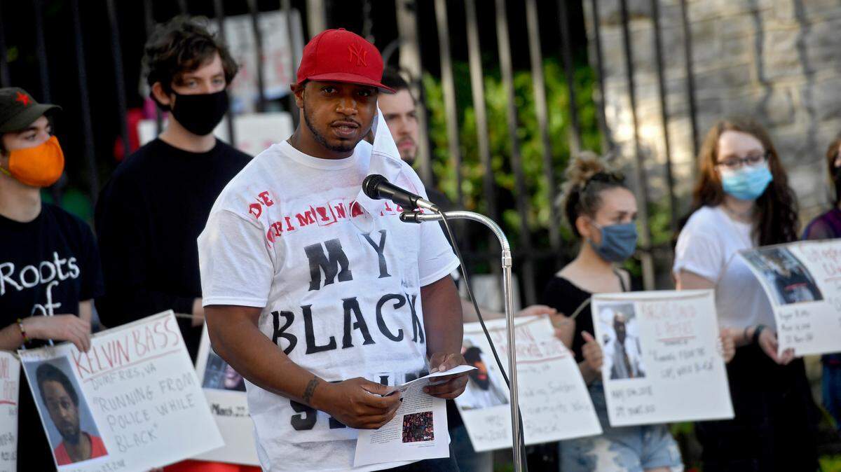 Divine Lipscomb reads a list of demands during the “Justice for Black Lives” protest organized by the 3/20 Coalition on Sunday, June 7, 2020.