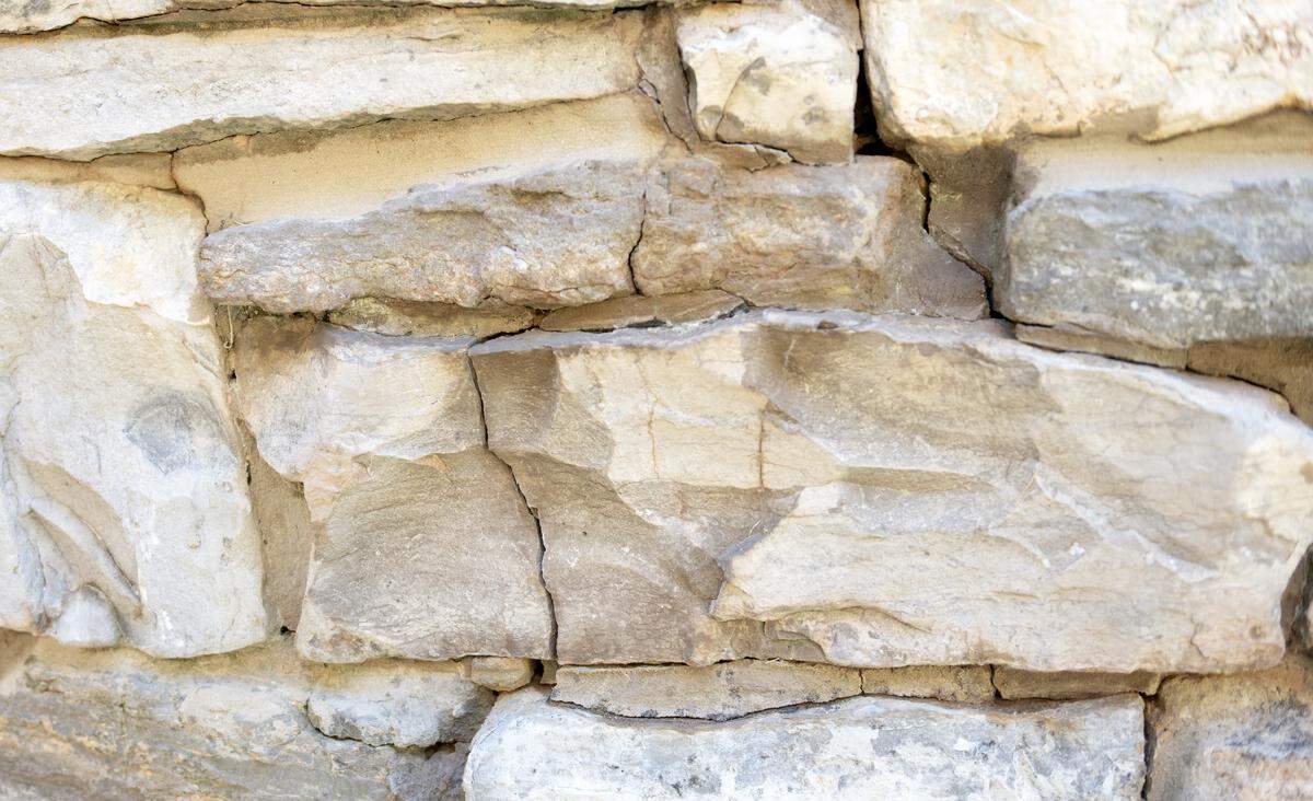 A section of the limestones of the Centre Furnace stack that has already been cleaned, and where cracks will be sealed to prevent water damage.  