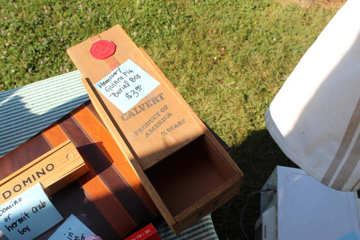 A wooden container that used to hold a bottle of Lord Calvert Canadian Whiskey from the 1950s found Friday at the 100 Mile Yard Sale that takes place in parts of Cameron, Centre, Clearfield and Elk counties.